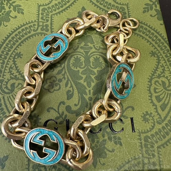 Authentic green/teal enamel and gold tone bracelet.